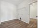 Laundry room with washer and dryer hookups and wire shelving at 2229 Camber Dr # Cwo0100, Gastonia, NC 28054
