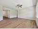 Open-concept living room with hardwood floors and neutral paint colors at 2229 Camber Dr # Cwo0100, Gastonia, NC 28054