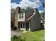 Two story home with neutral siding, chimney and well-manicured lawn at 2335 Brookview Ct, Rock Hill, SC 29732
