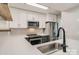 Kitchen featuring bright white cabinets, stainless steel appliances, and hardwood floors at 2335 Brookview Ct, Rock Hill, SC 29732