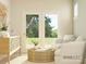 Relaxing sitting area with natural light, perfect for reading or relaxation at 2807 Morning Song Way, Lancaster, SC 29720