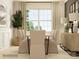 Elegant dining room featuring a large window, stylish lighting and an eye-catching plant in a basket at 2820 Morning Song Way, Lancaster, SC 29720