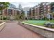 Well-maintained courtyard with fountain, putting green and beautiful landscaping at 300 W 5Th St # 136, Charlotte, NC 28202