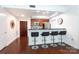 Charming kitchen bar area with stainless steel appliances and dark countertop at 300 W 5Th St # 136, Charlotte, NC 28202