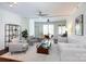 Bright living room with white walls, recessed lighting, and hardwood floors at 300 W 5Th St # 136, Charlotte, NC 28202