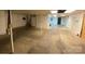 Spacious unfinished basement with exposed pipes and walls, offering potential for customization at 3014 Haigler Rd, Monroe, NC 28110