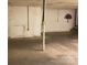 Unfinished basement with concrete floor and walls, offering storage space and potential for customization at 3014 Haigler Rd, Monroe, NC 28110
