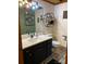 Stylish bathroom features a sleek vanity, modern fixtures, and decorative tile flooring at 3014 Haigler Rd, Monroe, NC 28110