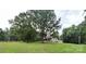 Charming log cabin home, surrounded by mature trees, offering a peaceful and private setting at 3014 Haigler Rd, Monroe, NC 28110