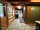 Functional laundry room with wood paneled walls, providing both style and utility at 3014 Haigler Rd, Monroe, NC 28110