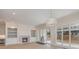 Bright living room featuring fireplace, built-in shelving, and large sliding doors, seamlessly connecting indoor and outdoor spaces at 3131 Providence Rd # 1A, Charlotte, NC 28211