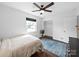 Cozy bedroom featuring a neutral color scheme, hardwood floors and a window with natural light at 4024 Seaforth Dr, Charlotte, NC 28205