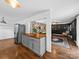 Spacious kitchen with wood countertops and gray cabinets, open to the living room at 4024 Seaforth Dr, Charlotte, NC 28205
