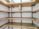 Unique wooden shelving with metal supports at 4024 Seaforth Dr, Charlotte, NC 28205