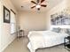 Well-lit bedroom boasts a ceiling fan, a window view, and stylish decor at 44429 Oriole Dr # 102, Indian Land, SC 29707