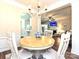 Dining room with chandelier adjacent to an open concept kitchen and living room at 44429 Oriole Dr # 102, Indian Land, SC 29707