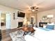 Inviting living room featuring a fireplace, hardwood floors, and a comfortable seating area at 44429 Oriole Dr # 102, Indian Land, SC 29707
