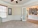 Bright office space with neutral walls, complemented by a window and stylish decor at 44429 Oriole Dr # 102, Indian Land, SC 29707