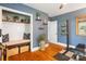 Home gym featuring a storage bench and open shelving for organization at 4626 Fairbluff Pl, Charlotte, NC 28209