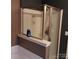 Bathroom featuring a glass-enclosed shower, tiled walls, and essential bath products neatly arranged at 464 Laurel Fork Dr, Fort Mill, SC 29715