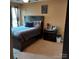 Bedroom with a beautiful bed, a nightstand, and a window with curtains, creating a peaceful atmosphere at 464 Laurel Fork Dr, Fort Mill, SC 29715