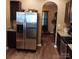 Stainless steel refrigerator and granite countertops highlight this functional kitchen space at 464 Laurel Fork Dr, Fort Mill, SC 29715
