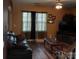 Comfortable living room with cozy furniture, hardwood floors, and natural light from the window at 464 Laurel Fork Dr, Fort Mill, SC 29715