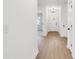 Entryway featuring luxury vinyl flooring, a pendant light, and freshly painted walls at 540 Church St, Locust, NC 28097