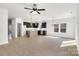 Open-concept living space with modern lighting and light-colored flooring at 544 Church St, Locust, NC 28097