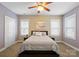 Relaxing bedroom with neutral tones, natural light, and a comfortable sleeping area at 612 Baldwin Ave, Charlotte, NC 28204