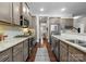 Well-equipped kitchen featuring stainless appliances, granite countertops, and open layout at 612 Baldwin Ave, Charlotte, NC 28204