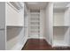 Walk-in closet with custom shelving and ample storage space, perfect for organization at 612 Baldwin Ave, Charlotte, NC 28204