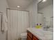 Cozy bathroom featuring a combination of wood cabinets, tile flooring and white walls at 668 Sixth Baxter Xing, Fort Mill, SC 29708
