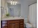 Bathroom featuring a vanity with storage and a shower/tub combination at 668 Sixth Baxter Xing, Fort Mill, SC 29708