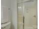 Clean bathroom featuring glass enclosed shower, white tile and sleek fixtures at 668 Sixth Baxter Xing, Fort Mill, SC 29708