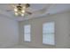 Bright bedroom with ceiling fan and two windows providing natural light at 668 Sixth Baxter Xing, Fort Mill, SC 29708