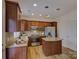 Kitchen featuring stainless steel appliances, granite countertops, and a kitchen island at 668 Sixth Baxter Xing, Fort Mill, SC 29708