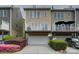 Townhome featuring a private balcony and rear entry garage, and tidy landscaping at 668 Sixth Baxter Xing, Fort Mill, SC 29708