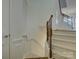 Carpeted staircase with decorative wooden railing and white paneled walls at 668 Sixth Baxter Xing, Fort Mill, SC 29708