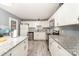 Inviting kitchen with granite countertops, stainless steel appliances, and plenty of storage at 745 6Th Sw Ave, Hickory, NC 28602