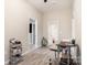 Bright home office with light grey walls and ceiling fan, plus convenient access to the bathroom at 745 6Th Sw Ave, Hickory, NC 28602