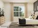 Modern bedroom with a large window dressed with curtains, and stylish decor at 8432 Norman Forest Rd, Lancaster, SC 29720