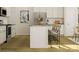 Spacious kitchen featuring stainless steel appliances, granite countertops, and an island with bar stool seating at 8432 Norman Forest Rd, Lancaster, SC 29720