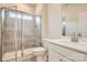 Bathroom featuring a glass-enclosed shower, modern fixtures, and vanity with ample countertop space at 8442 Norman Forest Rd, Lancaster, SC 29720
