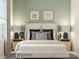 Serene bedroom with soft lighting, comfortable bed, and soothing decor for a peaceful retreat at 8442 Norman Forest Rd, Lancaster, SC 29720