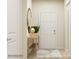Inviting entryway with a wooden console table and decor, leading to a bright interior at 8442 Norman Forest Rd, Lancaster, SC 29720