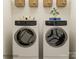 Efficient laundry room with modern washer and dryer set, maximizing functionality and style at 8442 Norman Forest Rd, Lancaster, SC 29720