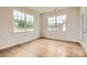 Home office featuring natural light, wood flooring, and neutral paint color scheme at 8442 Norman Forest Rd, Lancaster, SC 29720