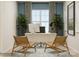 Well-lit home office with a large desk, comfortable seating, and decorative plants at 8442 Norman Forest Rd, Lancaster, SC 29720