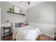 Cozy bedroom with hardwood floors, stylish decor, and a comfortable, inviting atmosphere at 8707 Copenhagen Ln, Charlotte, NC 28216